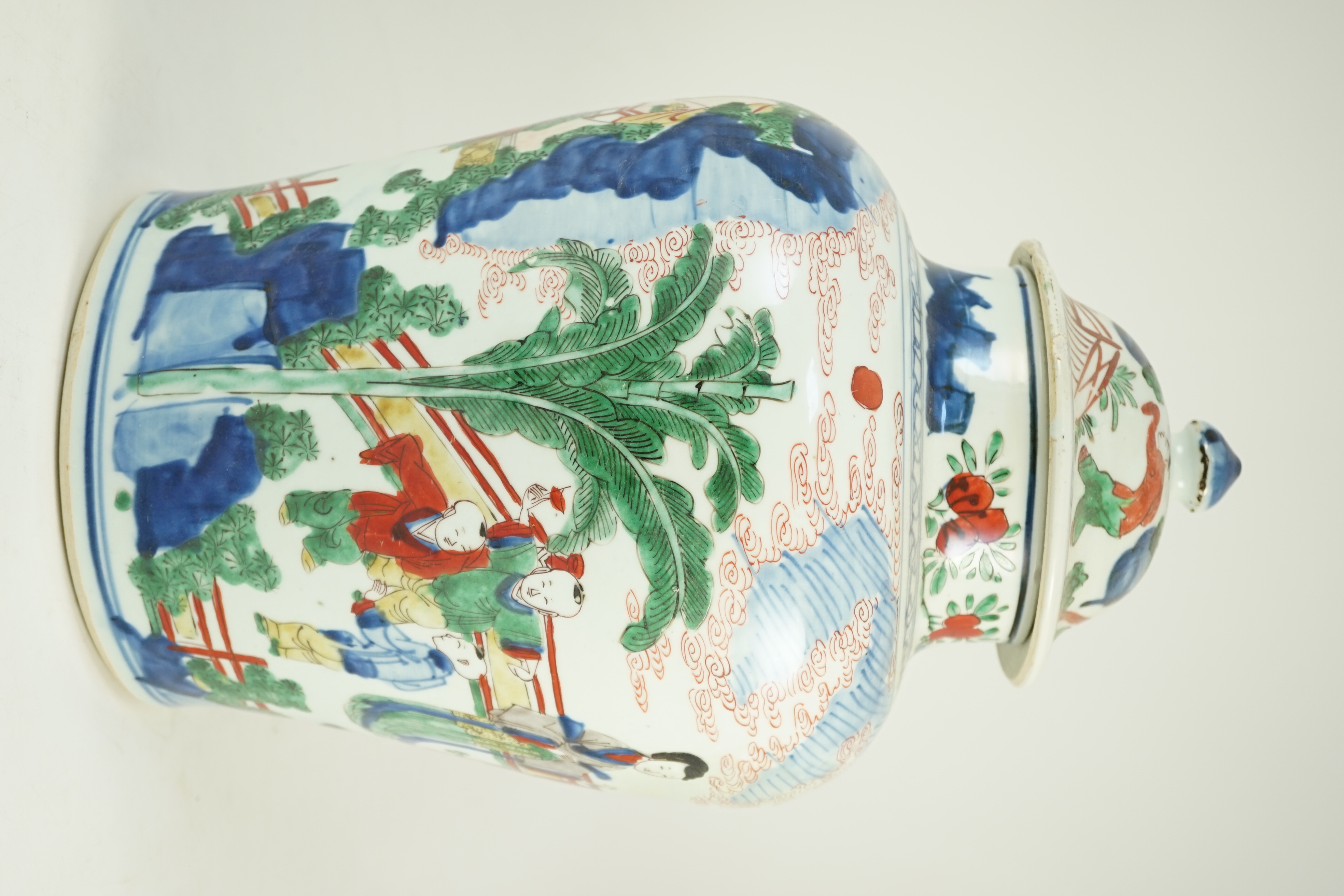 A Chinese Transitional wucai 'boys' vase and cover, c.1640, 41cm high